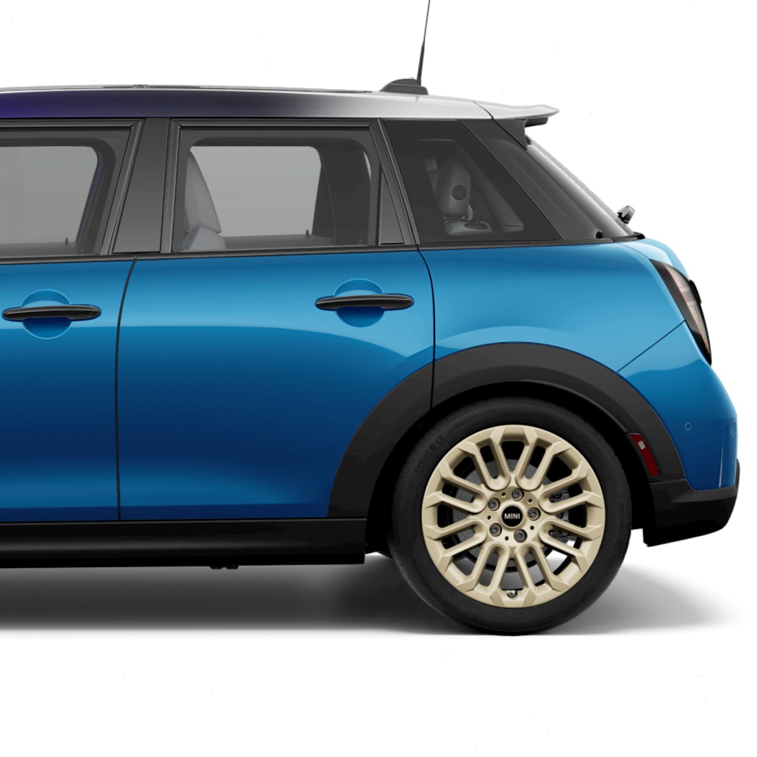 A side-view of a MINI Cooper S 2 Door from the rear door to the trunk.