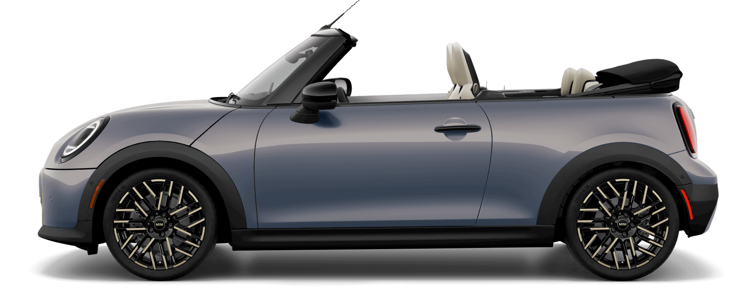 Side view of MINI Cooper S Convertible in the Cooper grey Metallic body color, facing left with its shadow underneath it. 