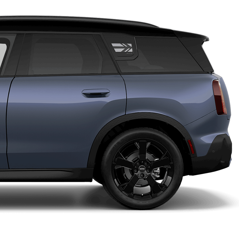 A side-view of a MINI Countryman S ALL4 from the rear door to the trunk. 