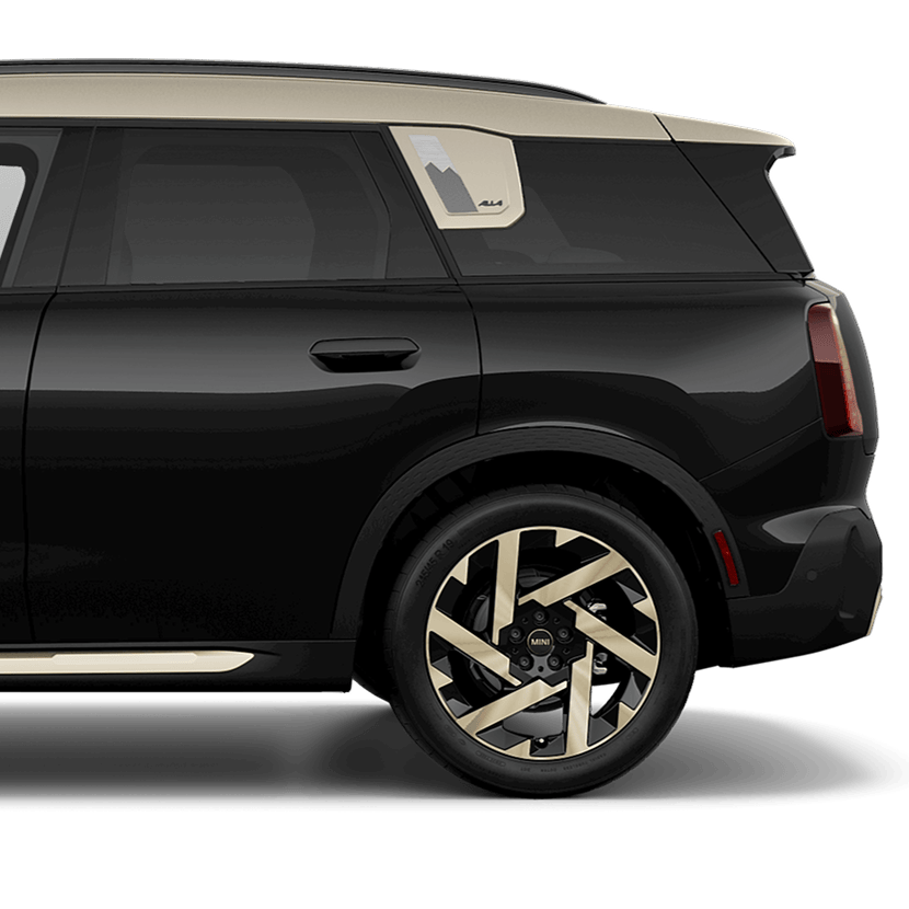 A side-view of a MINI Countryman SE ALL4 from the rear door to the trunk. 
