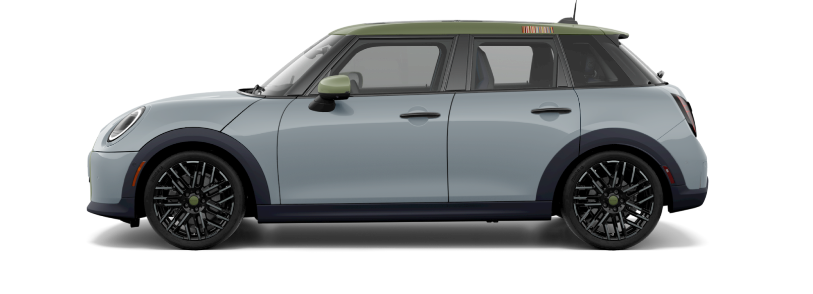 Side-view of a MINI Cooper S 4 Door Paul Smith Edition in Statement Grey with Nottingham Green accents.