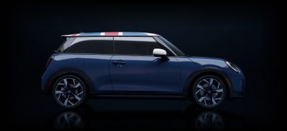 Side-view of the silhouette of a MINI wrapped in a British flag.