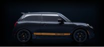 Side-view of the silhouette of a MINI covered in a dark lacquer.
